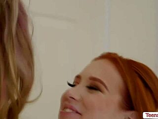 Curvy redhead sits intimately on hot masseuse's face