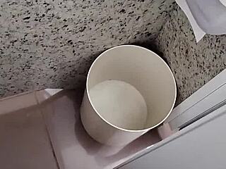 What lurks inside this public bathroom toilet stall? Solo amateur strokes small cock outdoors.