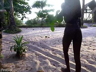 slim african babe struts naked through village hunting for cock