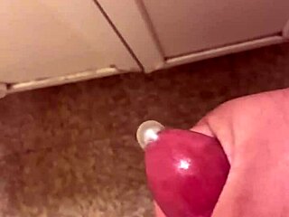 Masturbating creamy pussy with condom for intense solo orgasm explosion