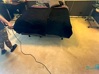 uh just vacuuming my bedroom as brunette housewife with natural tits