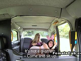 lesbians lick tits and spank on fake cab bonnet outdoors