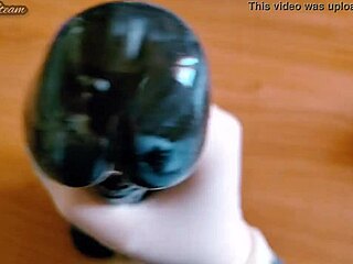 she grabs those gloves and strokes the massive black dildo close-up pov till it's throbbing wet and ready