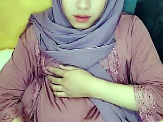 Indonesian crossdresser in hijab masturbates solo with Arab Asian flair