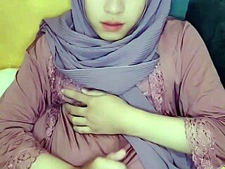 Indonesian crossdresser in hijab masturbates solo with Arab Asian flair