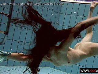 Brunette Janka's Long Hair Shimmers in Underwater Pool Shower Tease