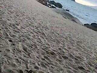 exhibitionist couple fucks on beach as stranger joins to cum on her