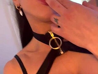 tattooed brunette masturbates with dildo in lingerie