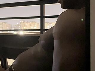 Brunette Gives Blowjob On Hotel Balcony