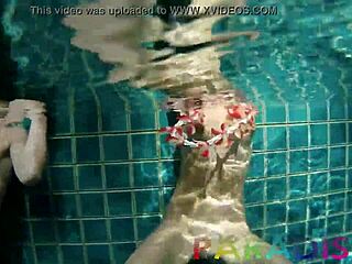 Two amateur twins fuck raw in a swimming pool