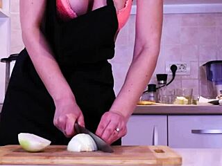 Young tall blonde nude in the kitchen with big natural tits