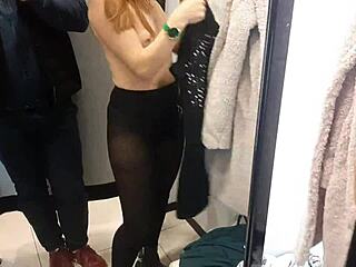 First person account of a hot red-headed woman wearing natural tits in the dressing room