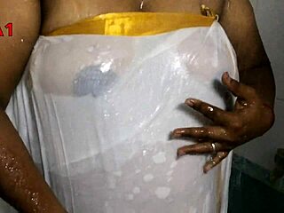 Indian step aunt shows off her crossdressing skills in the shower