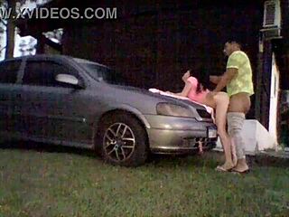 To test the shock absorbers the amateur couple places the car’s hood on it