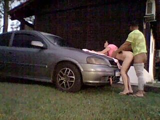 To test the shock absorbers the amateur couple places the car’s hood on it