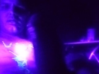 Blacklight: A gay solo masturbation session with a big dick