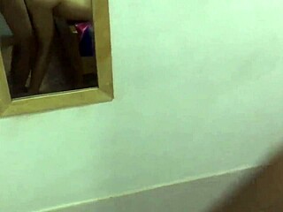 Burmese couple fucks in front of mirror in amateur video