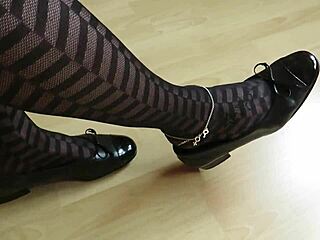 Isabelle-Sandrine showcases her fetish for Gabor pumps and opaque pantyhose in a German foot play video.