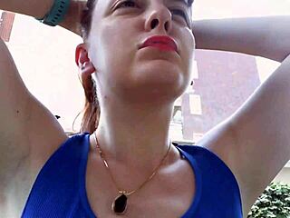 Nicoletta tries on earrings in her condominium garden for ear lovers