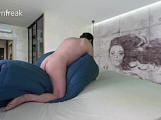 Wild humping on a down comforter with a cumshot