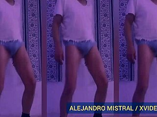 Alejandro strokes his large member in white and blue boxers