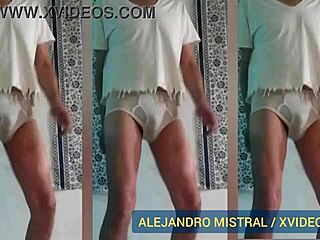 Alejandro strokes his large member in white and blue boxers