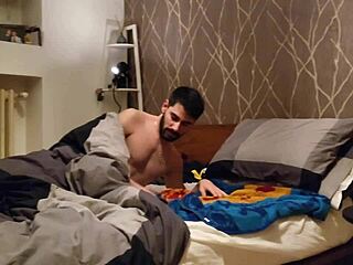 Gay guy gets blowjob in bed from partner