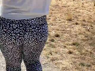 Revealing leggings show amateur beauty's curves at the park