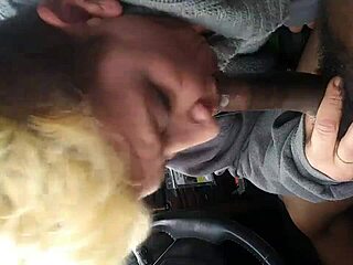 swallowing a black nut treat in intriguing way. it's all about the flavor and texture.