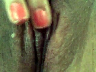 teen plays with her wet pussy using dildo