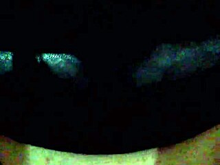 Face mask covers mouth during black dildo bondage and masturbation.