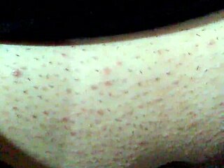 Face mask covers mouth during black dildo bondage and masturbation.