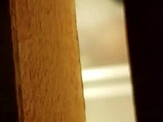 Spying on Her Shaving Her Hairy Pussy