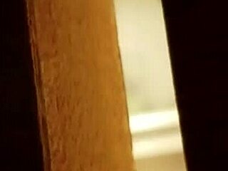 Spying on Her Shaving Her Hairy Pussy