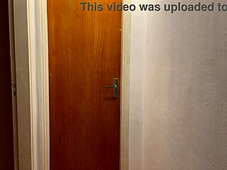 Young guys kissing get caught on building camera