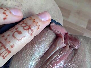 achieving orgasm by stuffing panties into wet pussy