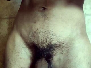 Gay man plays with his belly button and cums