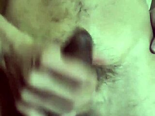 Gay man plays with his belly button and cums