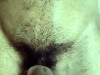 Gay man plays with his belly button and cums