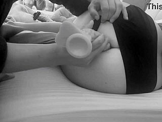 Camera captures amateur milf using dildo for anal during her period