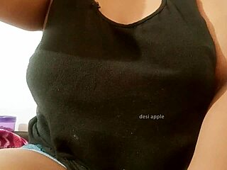 Sri Lankan lady displaying natural boobs and figure.