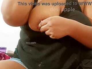 Sri Lankan lady displaying natural boobs and figure.