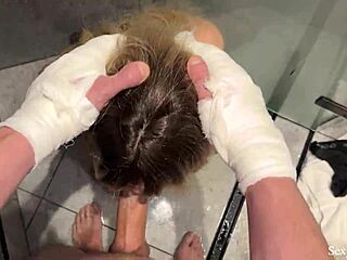 Stepmother steps in to help stepson with broken arms in bathroom, leading to holiday blowjob release.