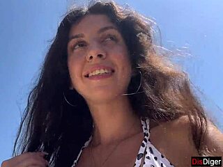 This hottie sucked me off on a public beach. Then walked with cum on her face!