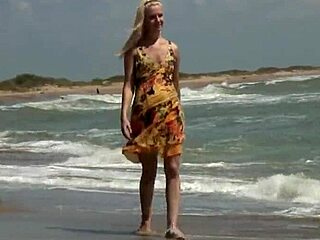 Sultry teen Agnes undresses for a sensual ocean bath