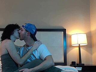 Making out passionately with this hot petite tattooed woman