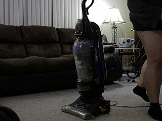 Chubby mom in shorts cleans the house thoroughly