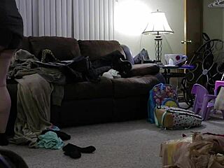 Chubby mom in shorts cleans the house thoroughly