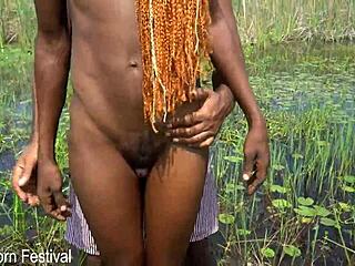 Skinny African Lady Strokes Tourist by the River