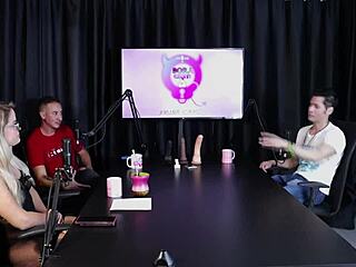 Blonde strips in sheer red lingerie at swingers house after guest's comment.